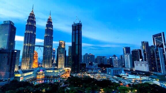 吉隆坡城市景观地标马来西亚旅游胜地4K昼夜时光流逝(向下倾斜)