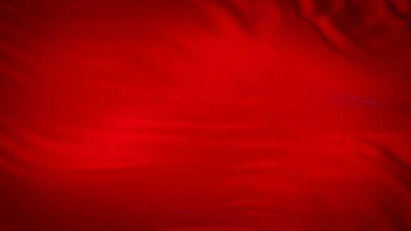 红色纺织织物在风中摇摆抽象的背景