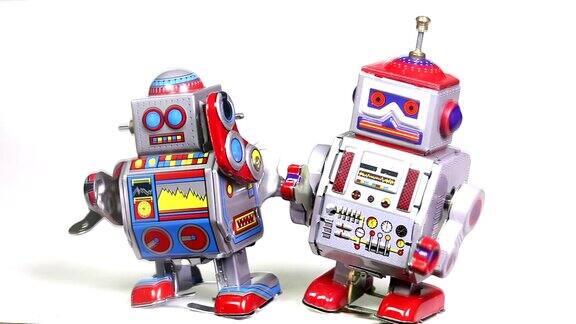 两个复古的锡玩具机器人