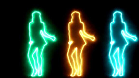 三个影子跳舞性感的女孩在发光的轮廓