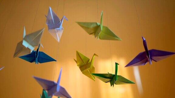 创意折纸鸟的背景手工玩具上的线想象力