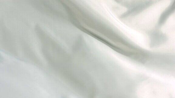 白色的丝织物随风飘荡抽象的背景