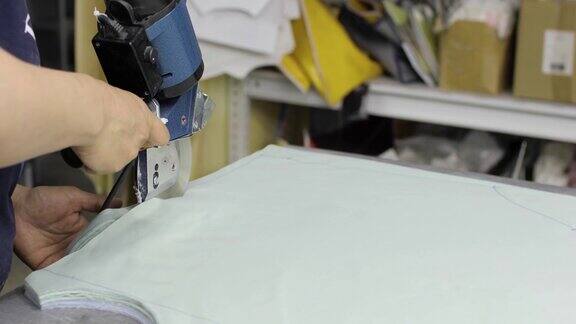 电动裁布机人剪边织物缝纫裁缝和服装制作