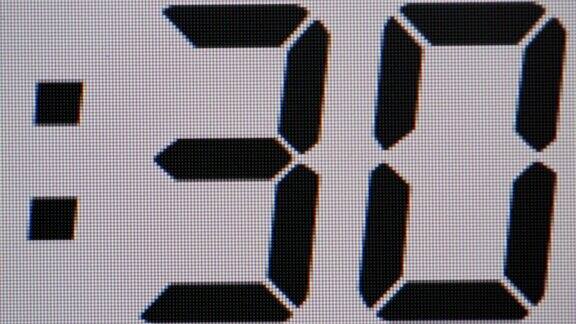 第二个倒计时从0到60个黑色数字在一个白色的数字屏幕上