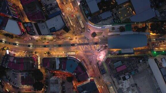 夕阳时分照亮吉隆坡市区著名的交通十字路口高空俯视图4k马来西亚