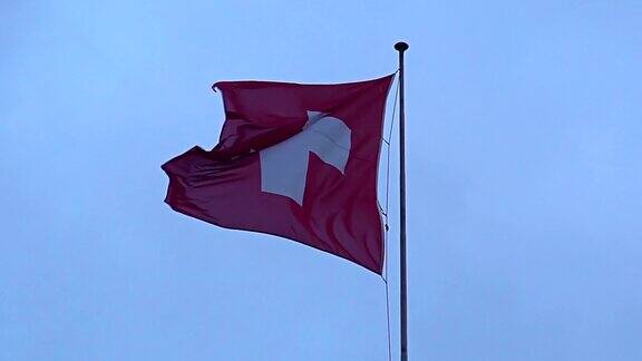 瑞士国旗迎风飘扬的天空背景国家象征