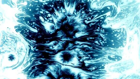 蓝色的水滴在白色上流动