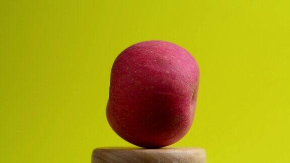 红苹果新鲜水果山竹果视频:苹果围绕着一个慢动作慢动作