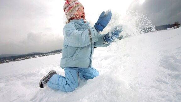 高清超级慢动作:孩子向空中抛雪