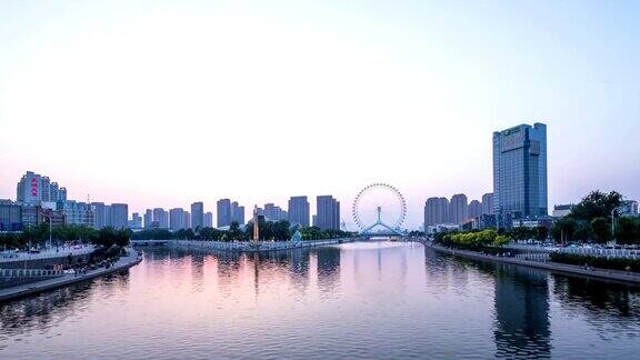 天津河边的和现代建筑黄昏到夜晚时光流逝