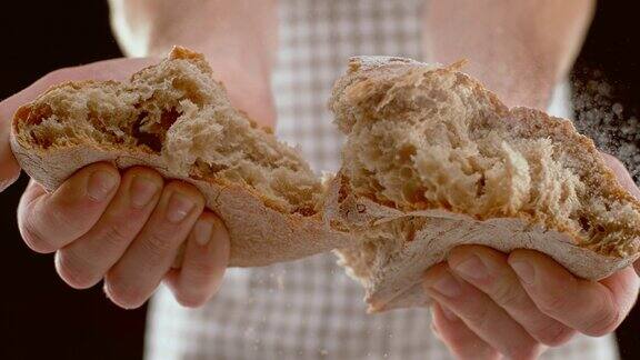 SLOMOLD人撕碎了一条家里烤的面包