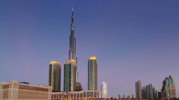 日落之光迪拜城世界最高的酒店建筑全景4k时间流逝阿拉伯联合酋长国