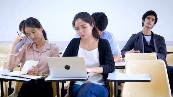 一群亚洲学生正在课堂上学习学习和教育理念