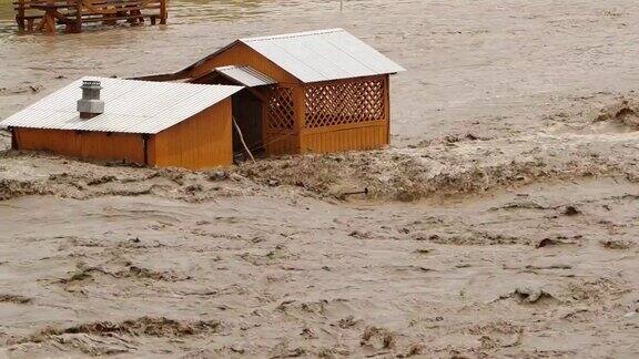 洪水冲走了建筑自然生态灾害河流泛滥全球变暖问题洪水