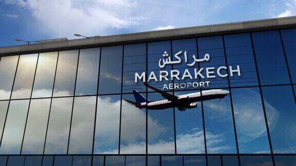 飞机降落在马拉喀什马拉喀什摩洛哥机场映照在航站楼