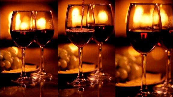壁炉背景上的两个红酒酒杯的垂直视频