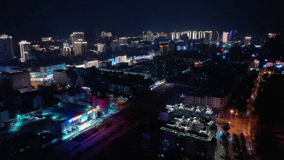 夜间照明海南岛三亚市航拍全景4k中国