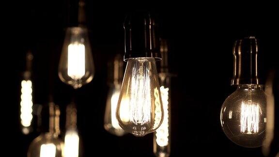 打开和关闭灯装饰古董爱迪生风格的灯泡悬挂在天花板上