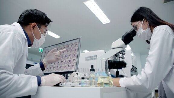 实验室技术员亚洲医疗技术员在私人实验室工作研究和发展学习