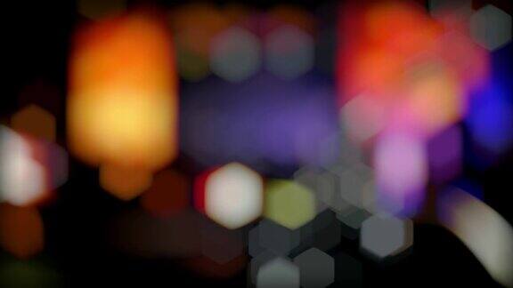 迪斯科耀斑模糊的灯光覆盖迪斯科舞厅抽象明亮散焦彩色散景派对模糊镜头照明无缝背景