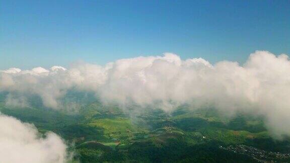 鸟瞰雨林山透过云层4KDCI