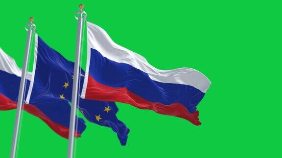 俄罗斯和欧盟的旗帜分别在绿色背景上飘扬