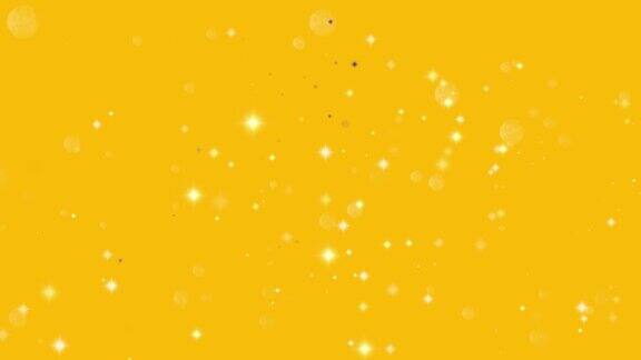 漂浮的星星和散景颗粒在黄色