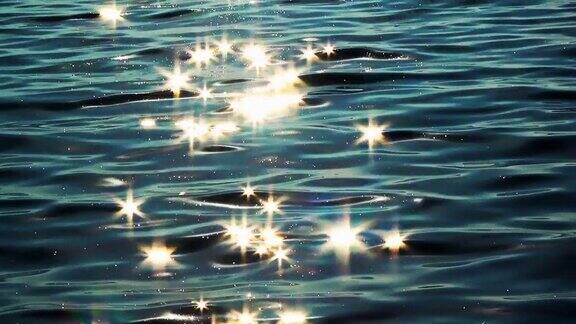 闪耀的阳光反射星星闪闪发光的海水