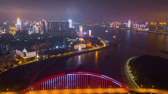 中国夜景时间照亮武汉城市景观青川大桥航拍全景4k时间流逝