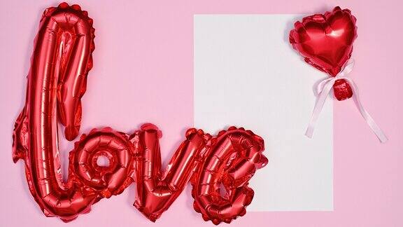 白色的纸与浪漫的红心和爱情气球出现在柔和的粉红色主题的文本停止运动情人节
