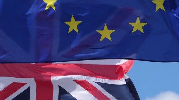 英国国旗和欧洲国旗在风中飘扬