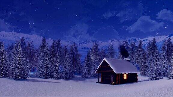大雪覆盖的高山小屋在冬夜降雪