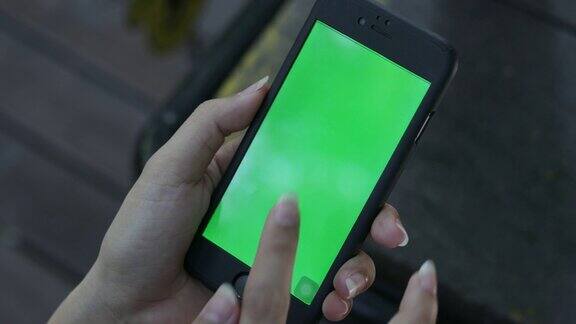 4K:用智能手机绿屏拉近女人的手