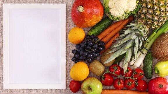 框架文本和食谱旁边的新鲜水果和蔬菜停止运动