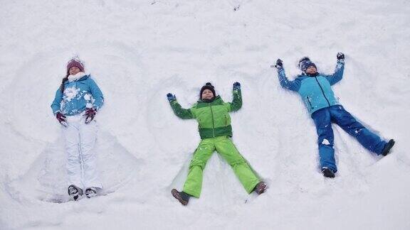 孩子们喜欢在新雪中制作雪天使