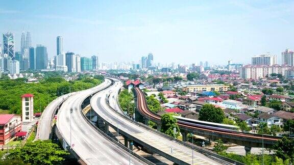 繁忙的交通现代建筑和吉隆坡的城市景观时光流逝