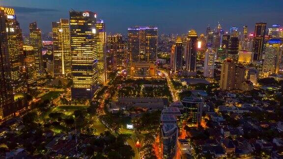 日落天空夜晚照明雅加达市区交通空中全景4k印尼