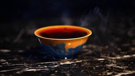 黑热中国茶杯大理石背景高清镜头