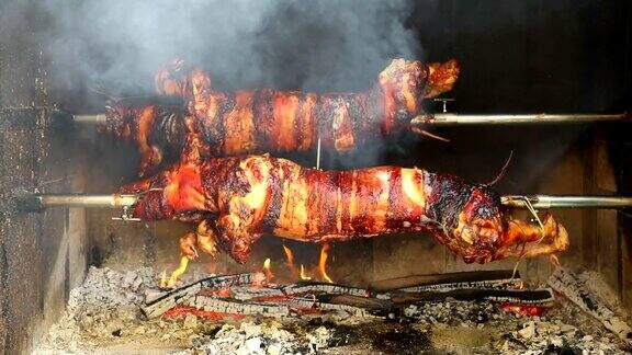 户外烧烤猪在火上烧烤