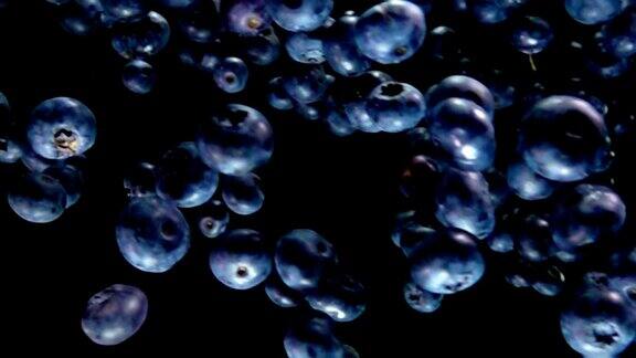 美味的蓝莓在黑色的背景上飞舞