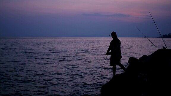 渔夫垂钓夕阳剪影