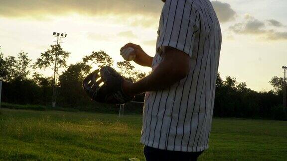 慢镜头:用棒球手套接住棒球