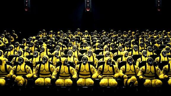 人们穿着防细菌的衣服坐在电影院里等着看电影穿着黄色防护服和防毒面具的人