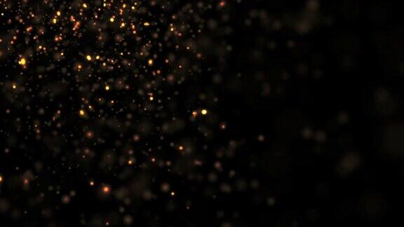 黑色背景上的抽象金粒子