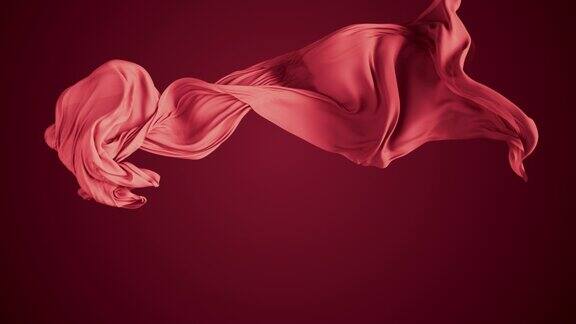 抽象派红色的流动缎面或丝绸布在慢动作