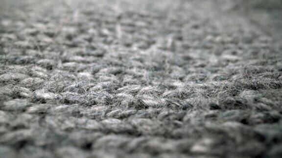 极端细节的绵羊羊毛布料纹理流动在微距小车拍摄