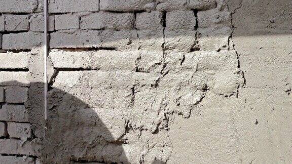砖墙上的沙子和水泥渲染