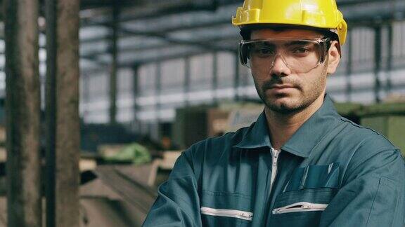 不快乐的年轻产业工人肖像慢动作中东男性工作服头盔工业和制造业概念