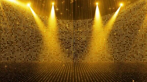 金色粒子聚光灯照射在闪烁的舞台背景上