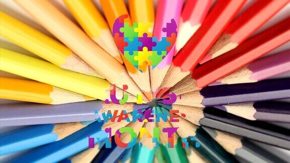 爱心拼图形成自闭症意识月文字对抗彩色铅笔旋转
